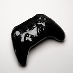 black xbox controller in ceramic