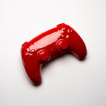red ps5 controller in ceramic